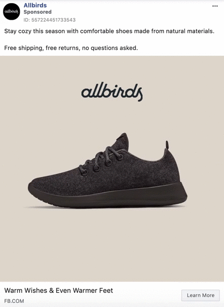 A single dark gray Allbirds sneaker is displayed on a plain beige background with the Allbirds logo above it. Text advertises comfort, natural materials, free shipping, and returns.