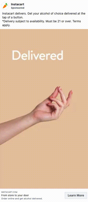 A hand making a snapping gesture against a beige background with the word "Delivered" above it.