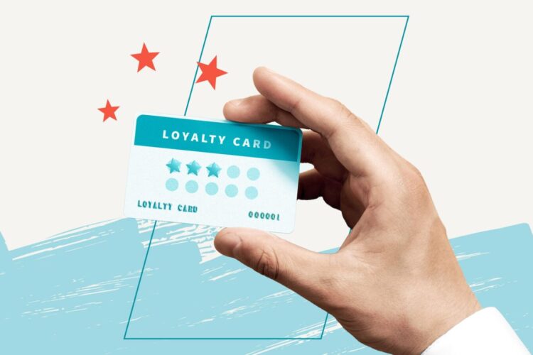 A hand holds a blue and white loyalty card with star icons. Three red stars and abstract blue and white shapes appear in the background.