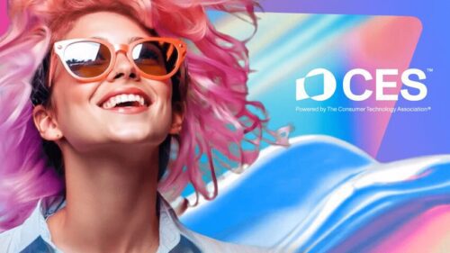 Smiling person with pink hair and sunglasses in front of a colorful abstract background with the CES logo and tagline.