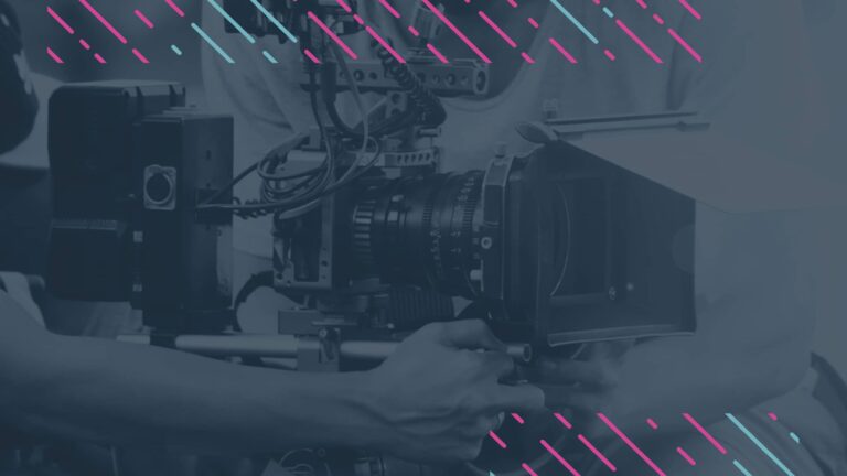 A person adjusts a professional video camera rig; the image has a blue tint with diagonal pink and blue graphic lines overlaying the top.